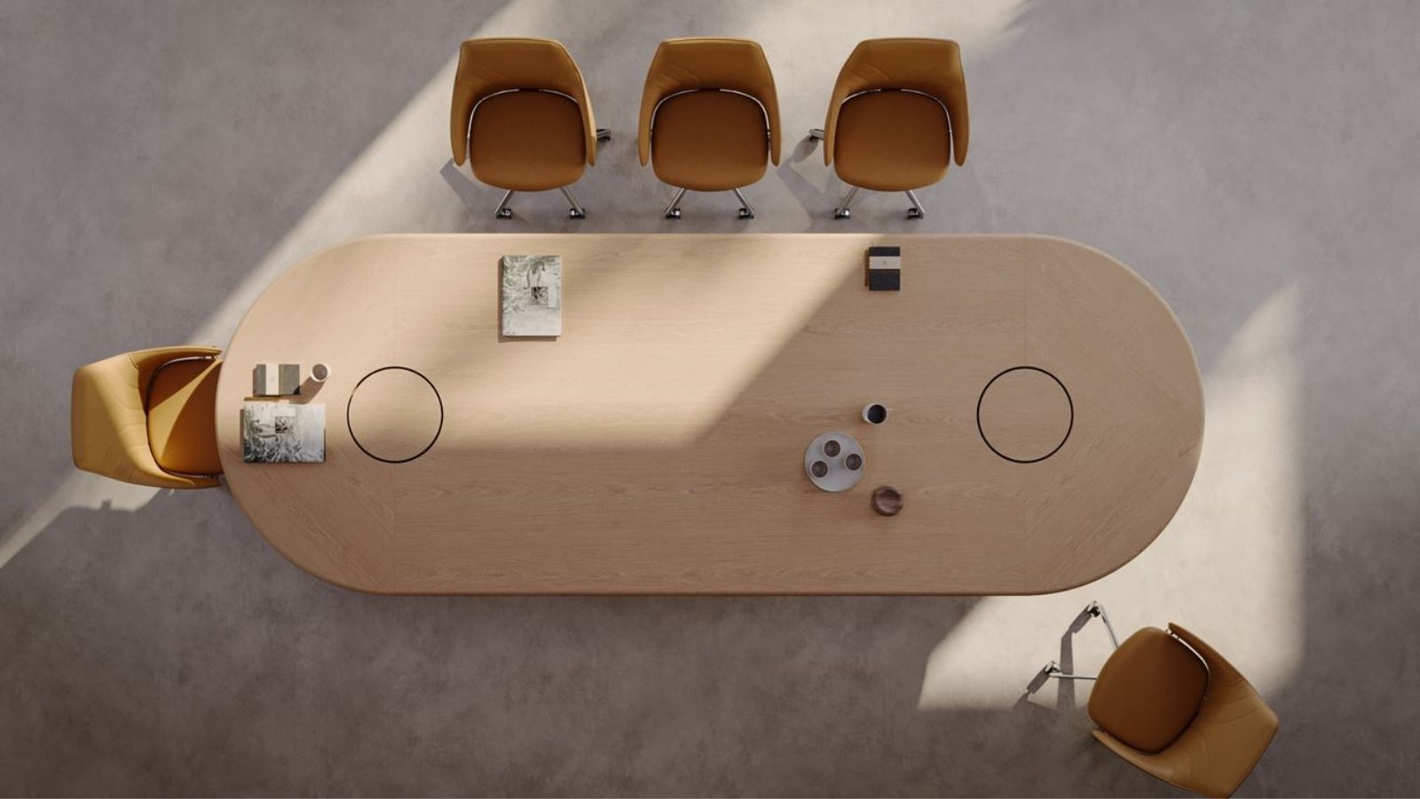 Mẫu bàn họp hình Oval bo cong các góc, kết hợp dàn ghế chân quỳ tạo cảm giác mềm mại cho phòng họp
